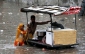 Child vendors sell food in a flood-hit Punjab town amid food crisis