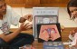 IPPF staff member explains the female reproductive system and how to use condoms