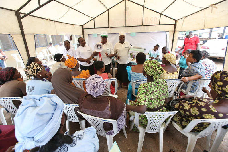 Mrs Oduola Tayo PPFN regional clinic officer, together with other medical officers educate women on family planning methods during a PPFN outreach programme at the Eni Ayo clinic in Ibadan, South West Nigeria