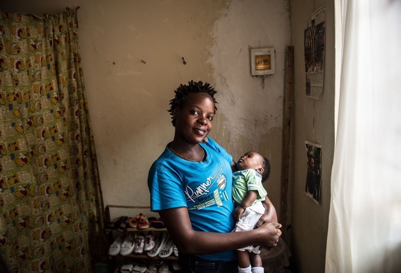 Masitula is a single mother with two sons. "I got pregnant after a client refused to wear a condom. I attempted to abort using some unsafe abortion practices but I was unsuccessful. I now have a two-month old baby whose father I do not know." 