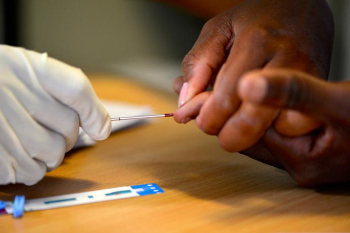 A client being tested for HIV.