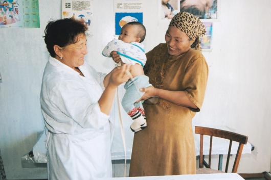 Kyrgyzstan mother and baby with nurse