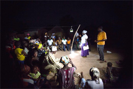 A night meeting in Ghana held using solar lanterns