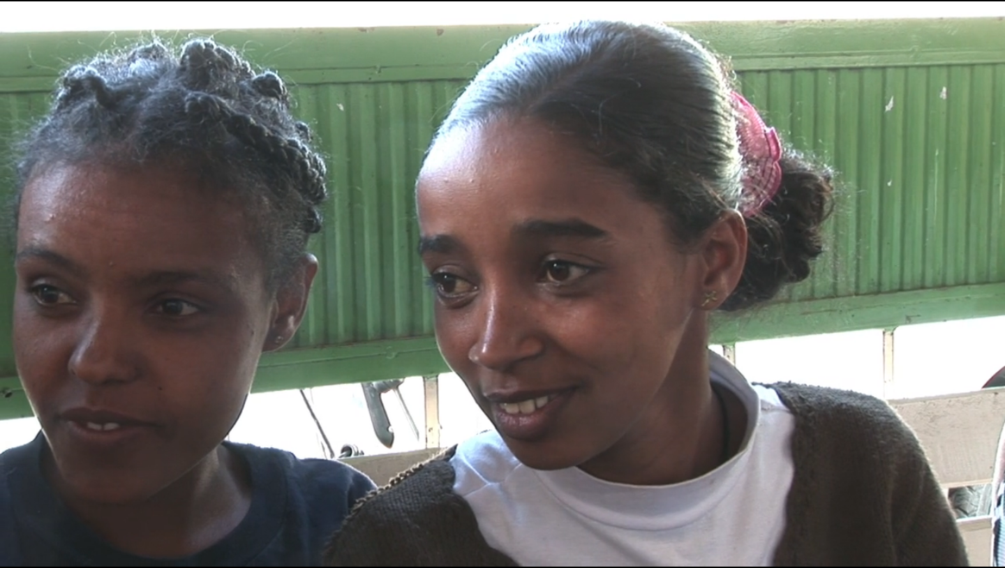 Two girls smiling