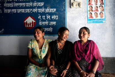 Three women sit together in IPPF clinic in Nepal