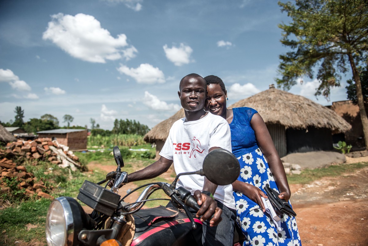 Husband and wife, clients, outside IPPF outreach clinic in rural Uganda