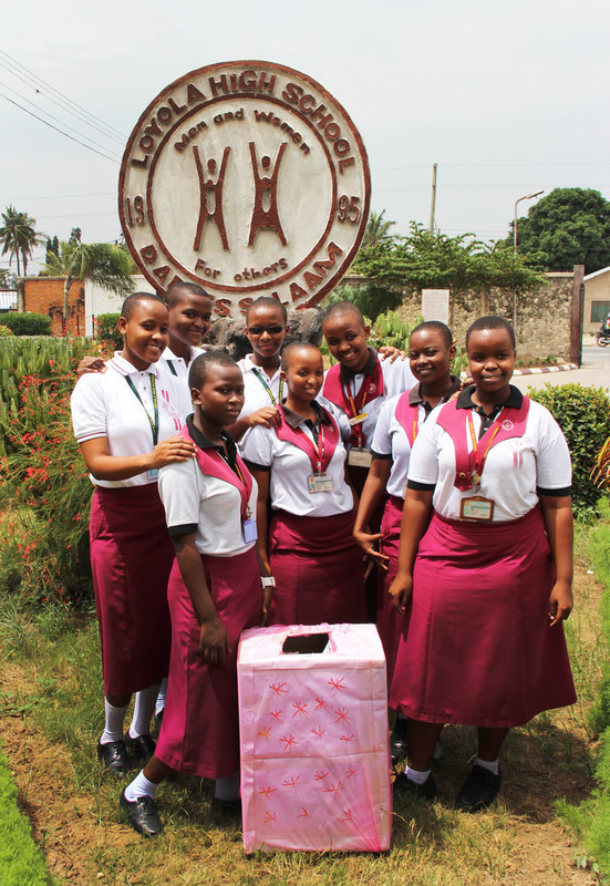 School girls with their pink box for sanitary pads
