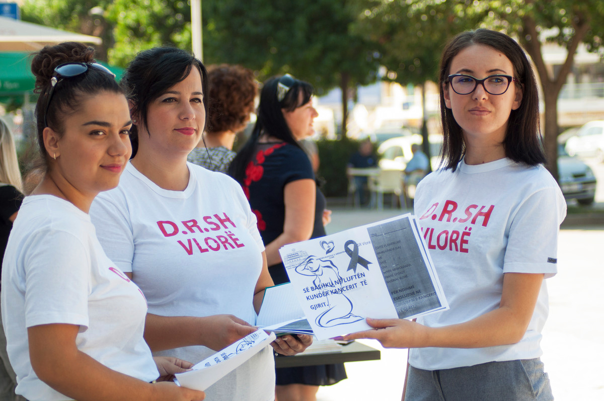 Youth volunteers handing out information on sexual & reproductive healthcare in Albania.