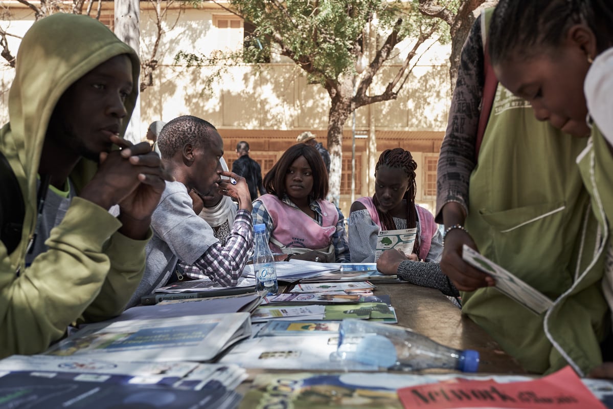 Student Fatou Bintou Diop (C), 20, attends a sex education session 