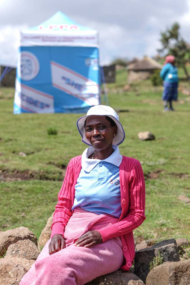 Raphel Kori, earns an income as a peer educator with Lesotho Planned Parenthood Association (LPPA). Nine months into her role, she goes door to door in her village trying to ensure parents understand the needs of adolescents in their village and why contraception and services like HIV testing is a protective measure for young people.