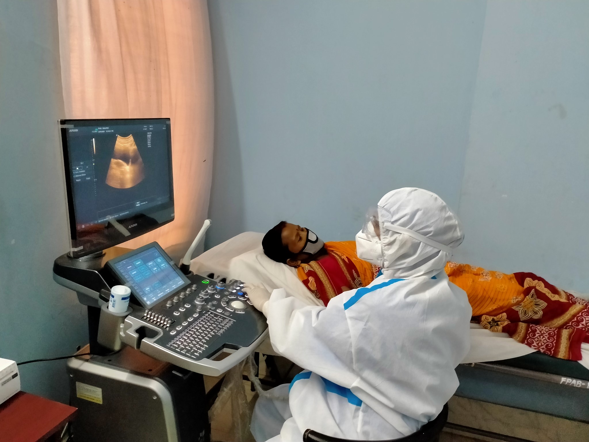 a woman received a scan at a clinic in Bangladesh during covid-19