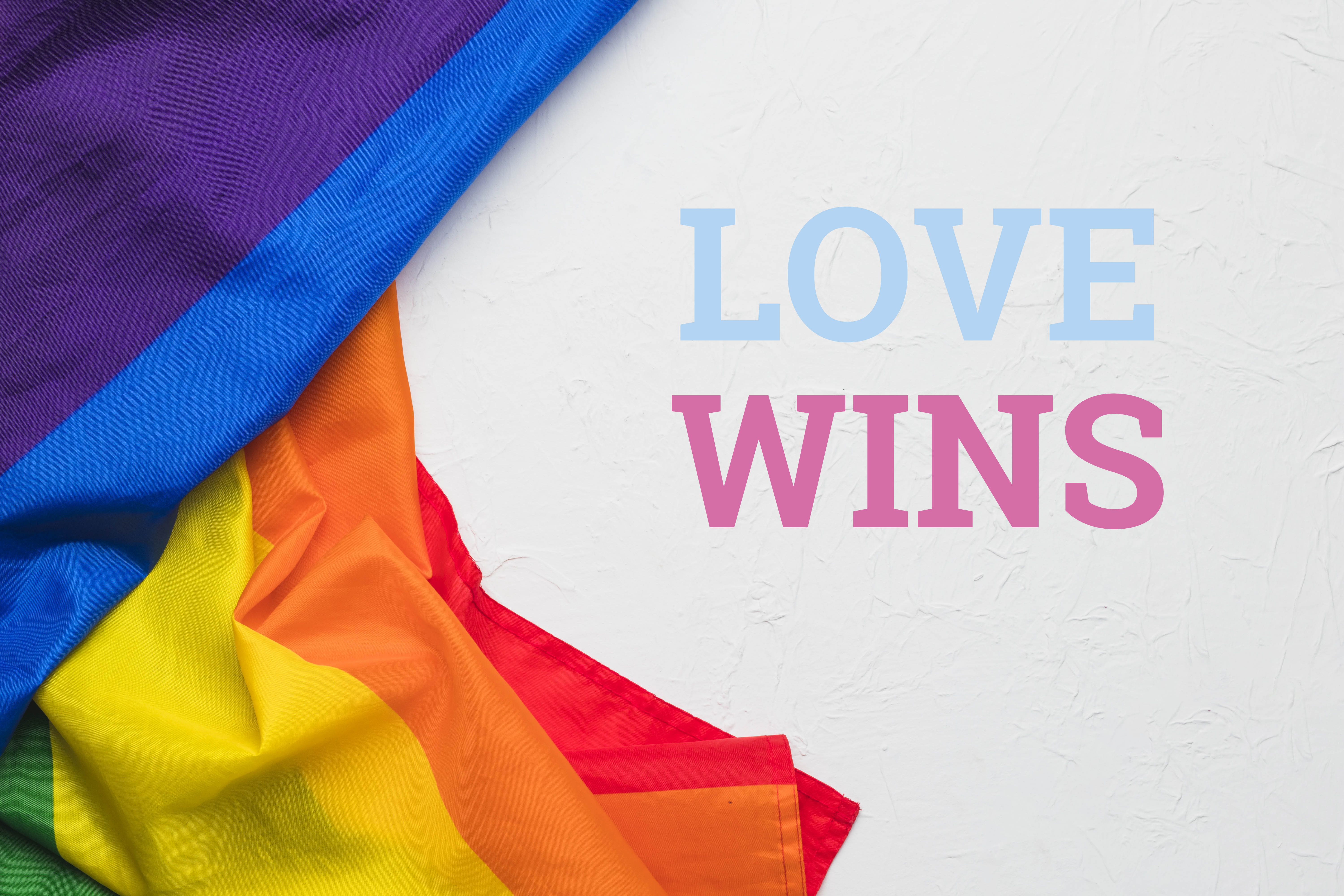 LGBTI+ flat with Love Wins text