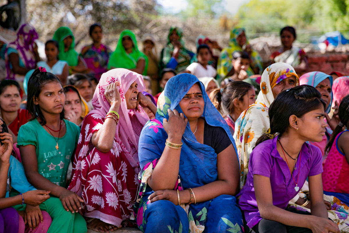 a group of women and girls in India