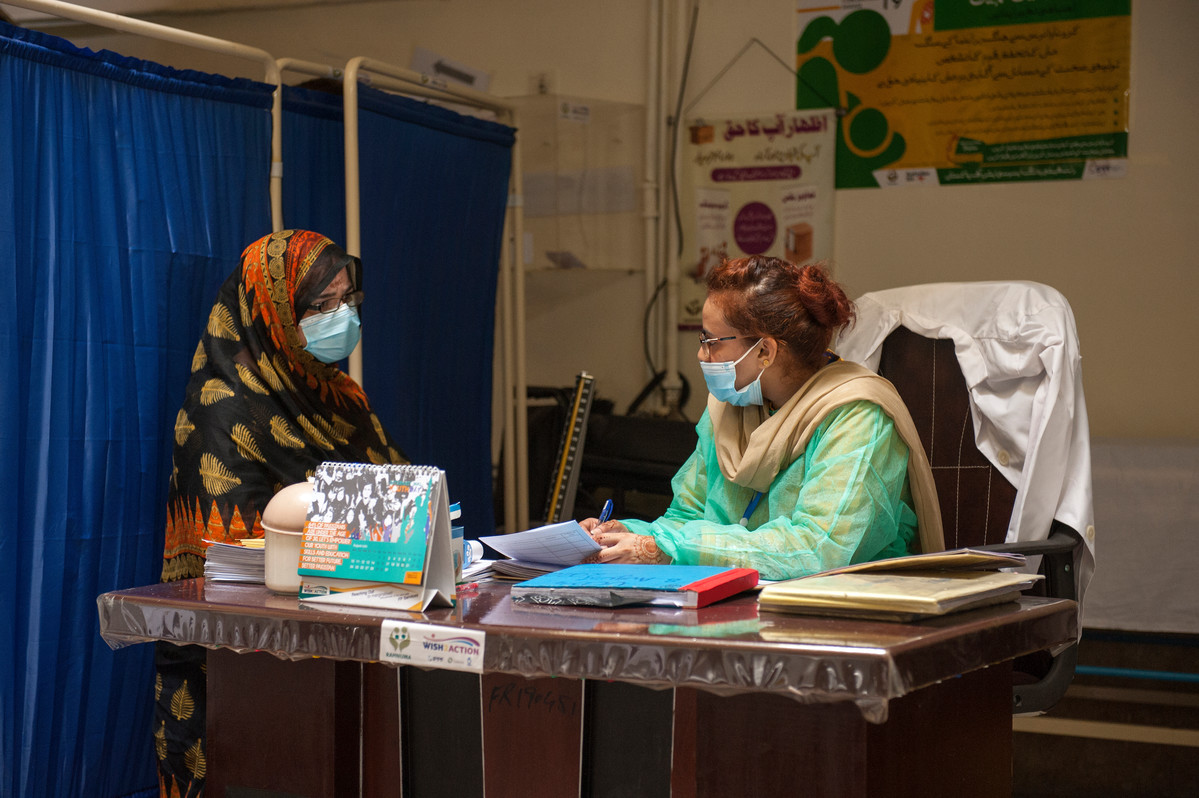 A photo from Pakistan of a woman receiving healthcare