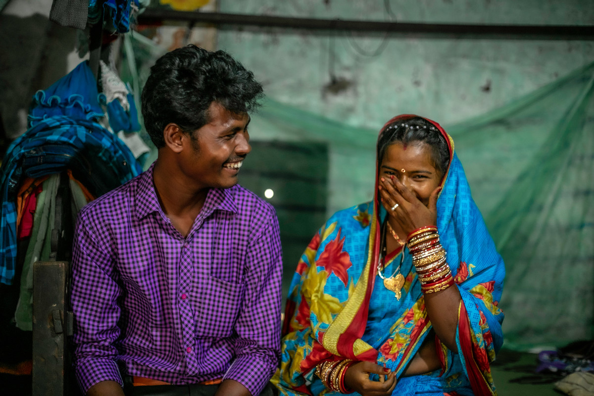 Young couple and clients.