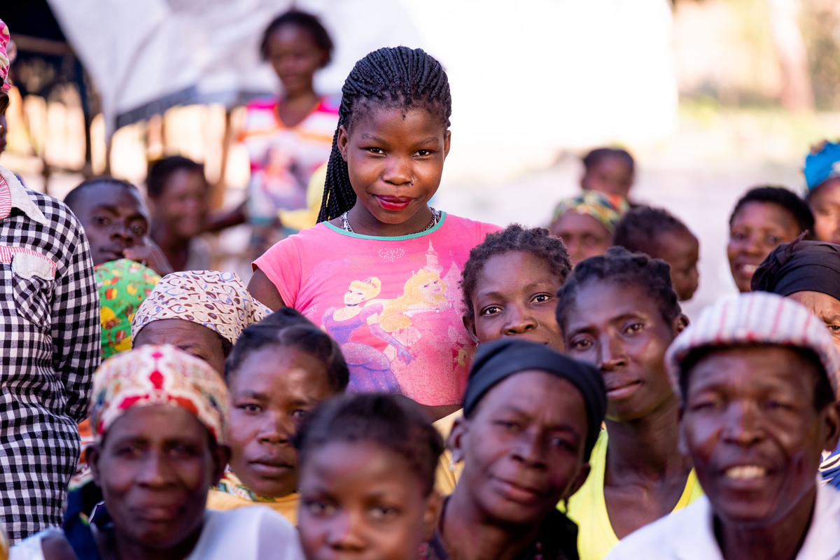 Young woman and a group 