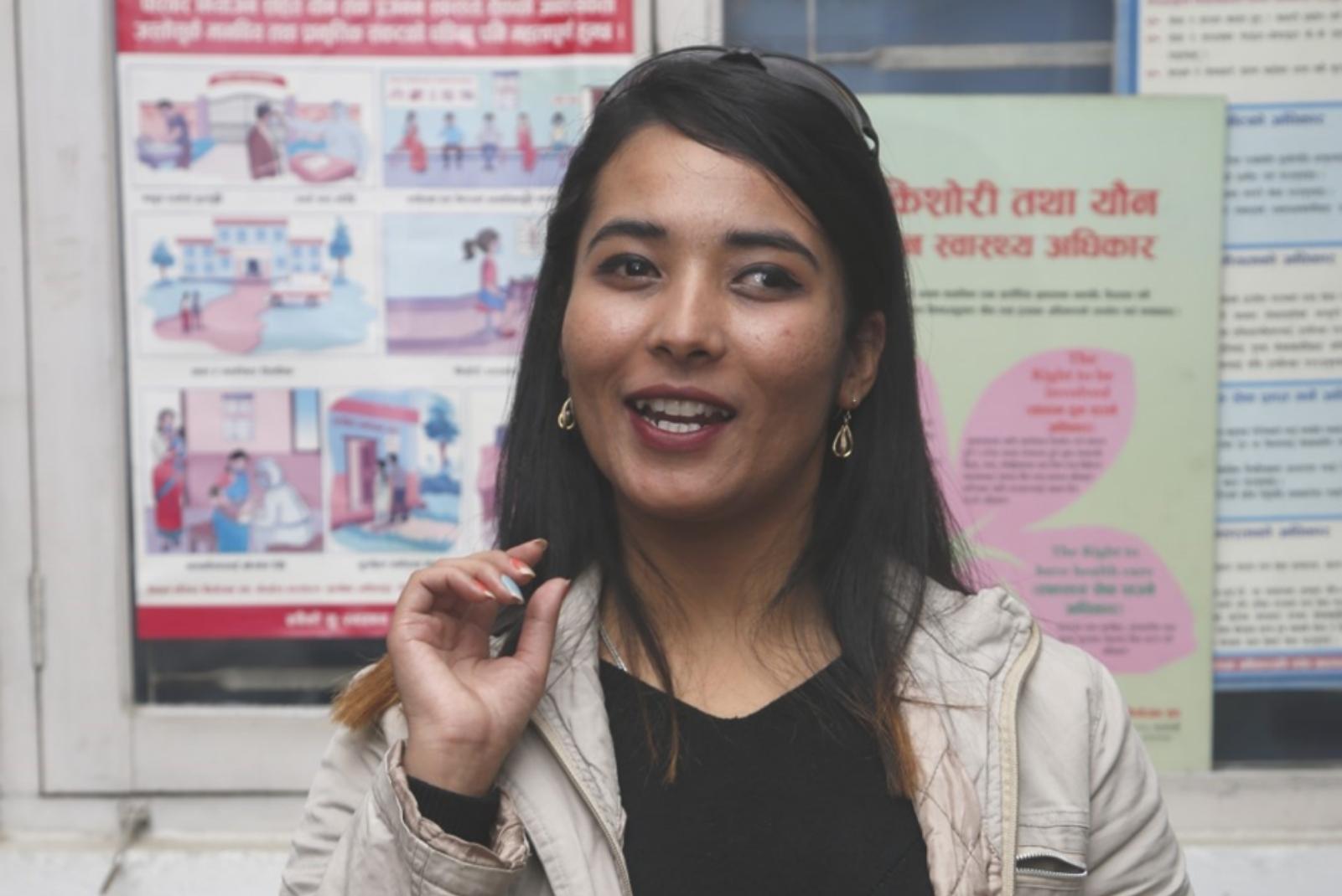 A photo of Sanjiya Shrestha speaking