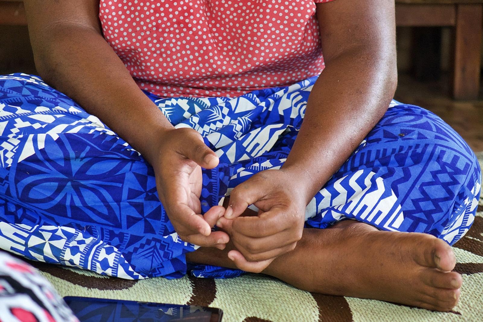 A woman's hands and feet