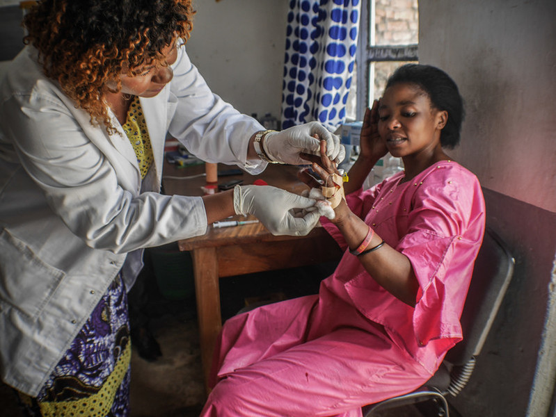 Humanitarian healthcare worker and client