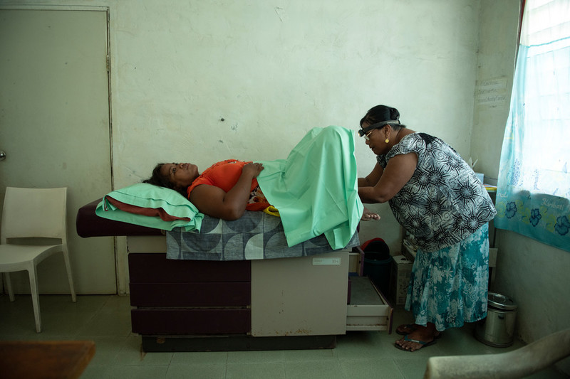 Client undergoing a cervical screening