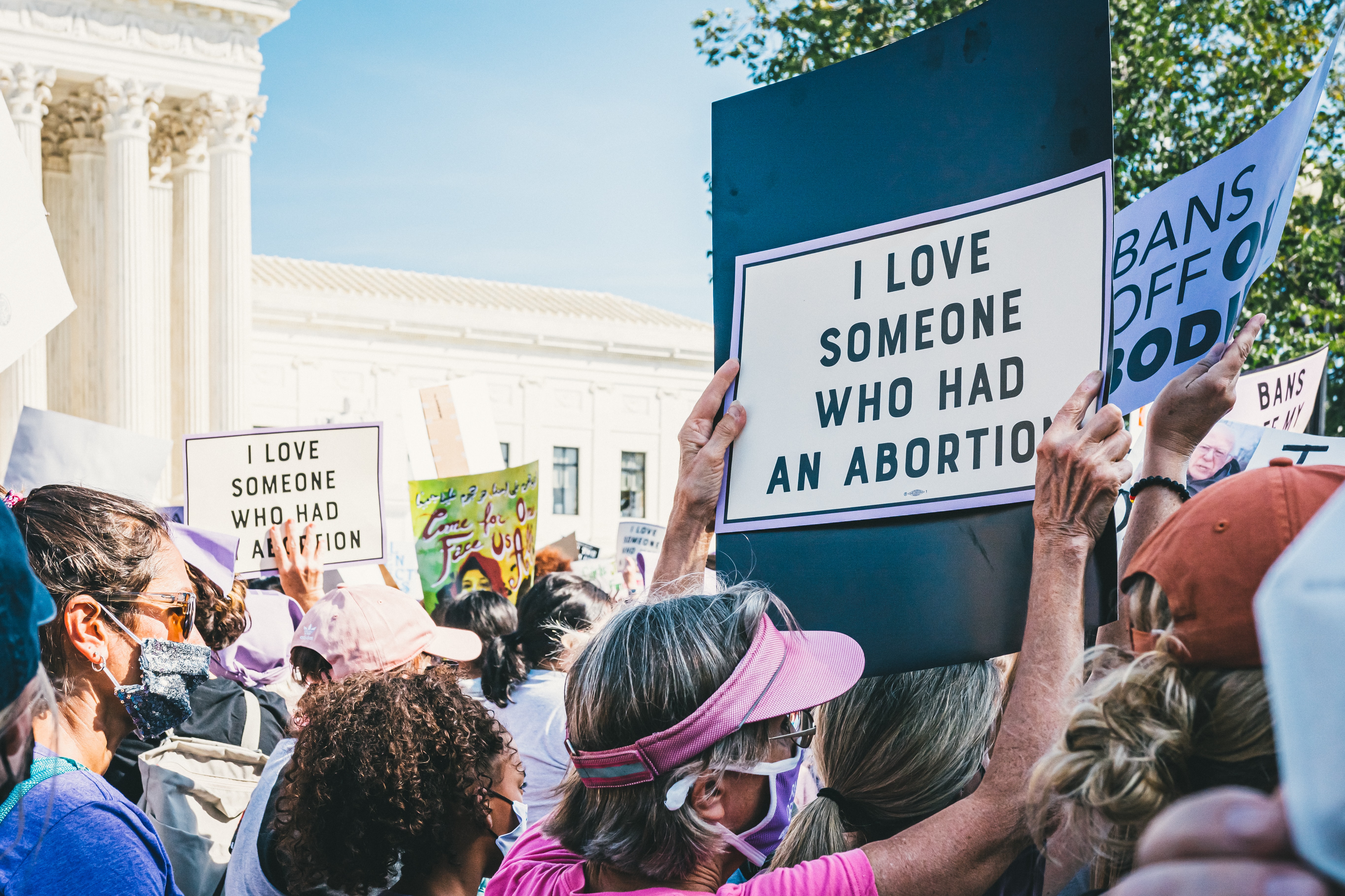 Protest sign reads "I love someone who had an abortion"