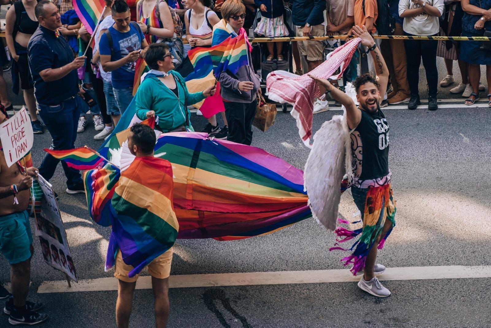 A person at a Pride parade - image by Lindsey LaMont