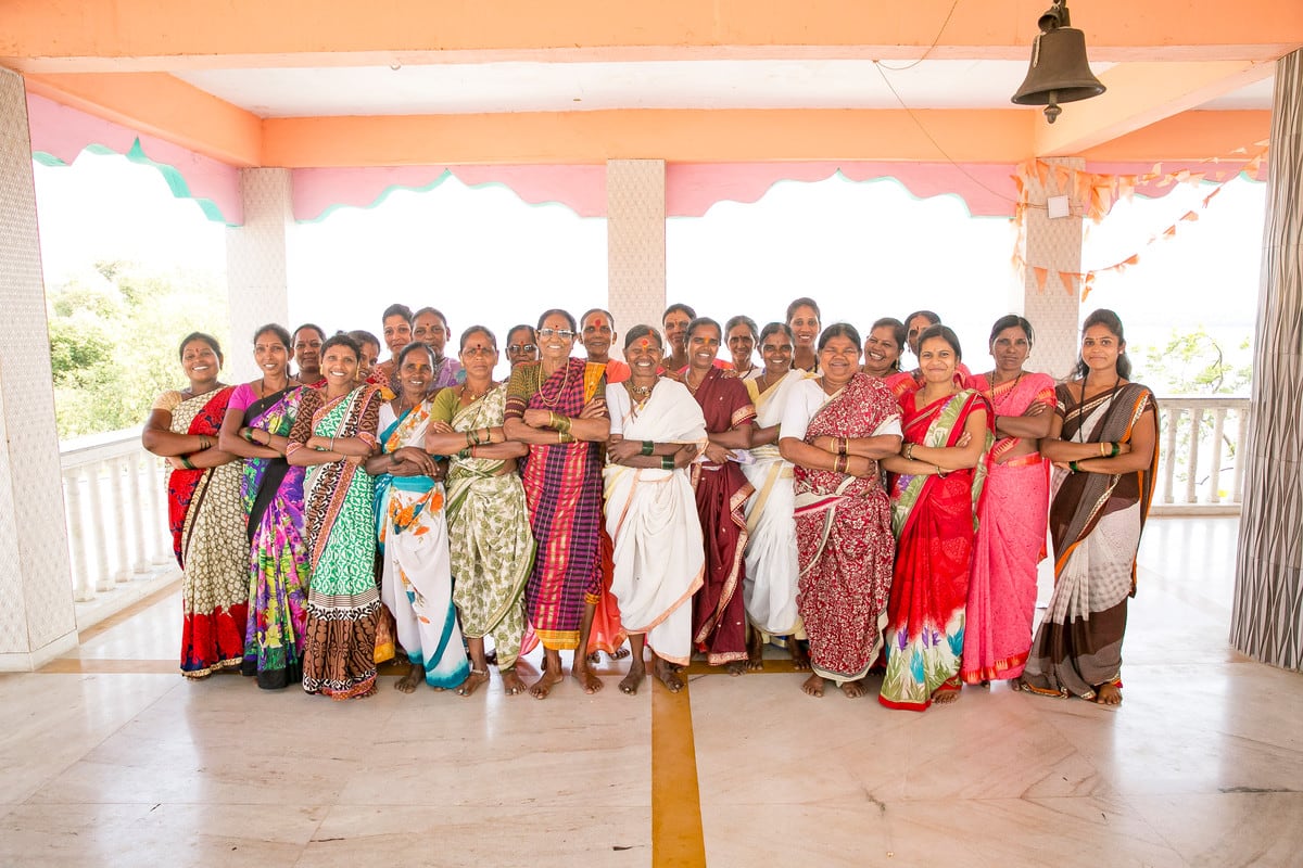 Mahila Mandal pose for a group photo after their drama performance in Banglapada village, Maharashtra, India.  Commissioned for GCACI 10th anniversary.