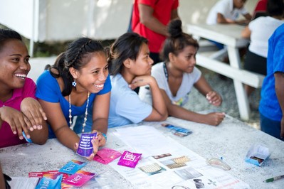 Young Kiribati volunteers at an outreach event
