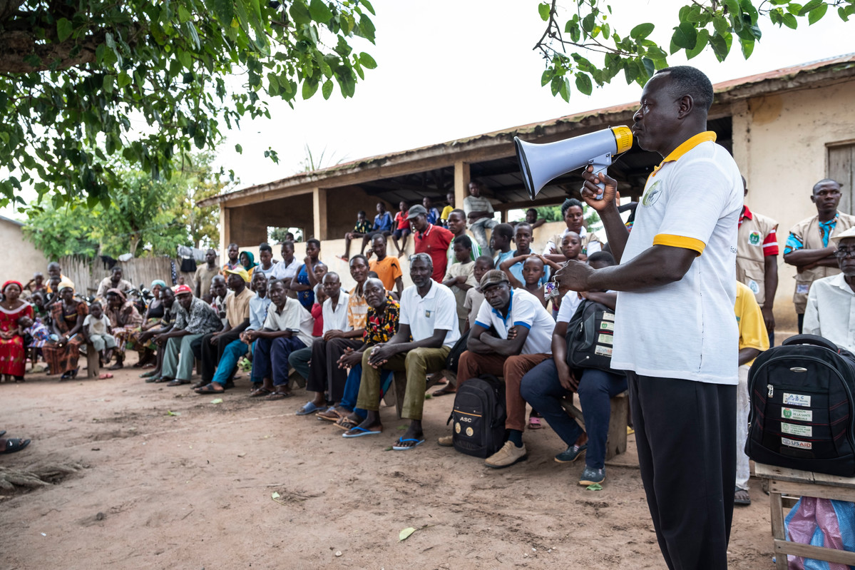 Villagers attend the ATBEF event about about contraception and family planning in Ilama, Togo.