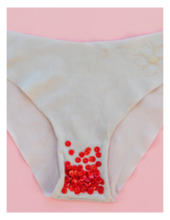 A pair of underwear with red sequins representing blood