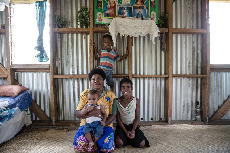 31 year old Elenoa with her children in her house in village Navala in Ra Province. "At the time of Cyclone Winston I was seven-months pregnant. It was already very hard trying to keep my other three children safe. I was alone with them because my husband went out hunting before the cyclone hit."