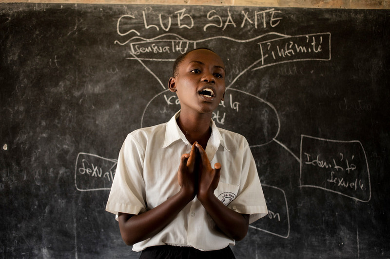 A peer educator talks to students during a health club session at the Municipal Lycee of Nyakabiga school in Bujumbura. 