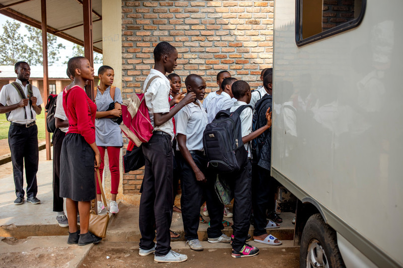 Students wait for their HIV test results outside the ABUBEF mobile clinic van at Municipal Lycee of Nyakabiga school in Bujumbura. 