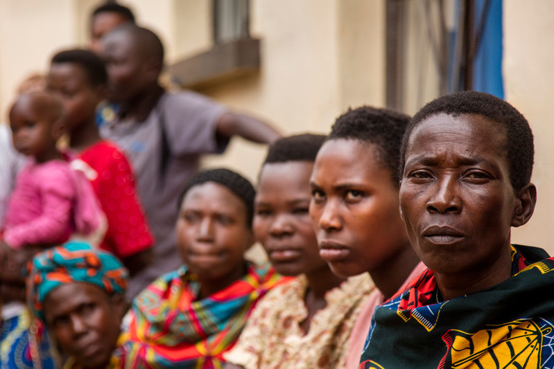 Pre-natal and HIV patients wait outside the busy ABUBEF clinic in Ngozi. 