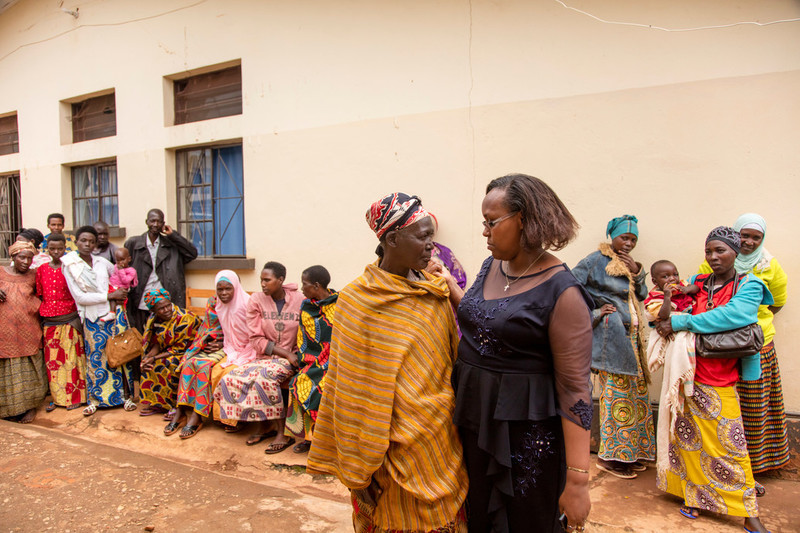 A regular at the clinic, Sada, talks with Agathonique the Clinic Manager at ABUBEF.