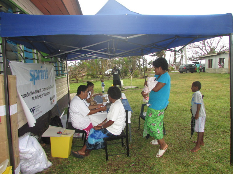 Our staff on the ground providing clients with sexual health services via mobile outreach pop-up clinics. 