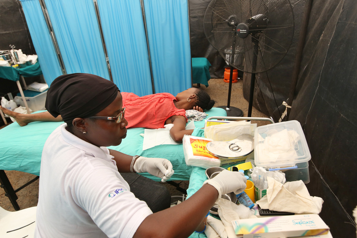 IPPF public health facility worker administers family planning to local clients