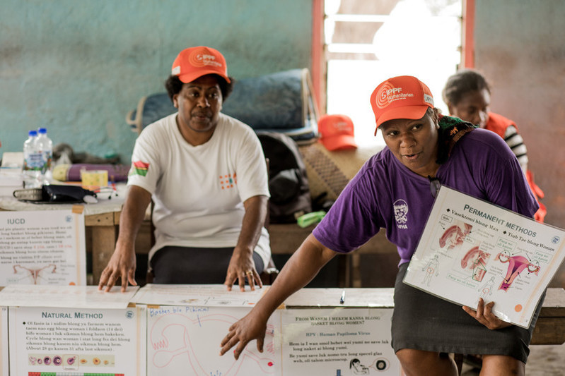 Staff talk to the local community about reproductive health and contraceptive choices. 