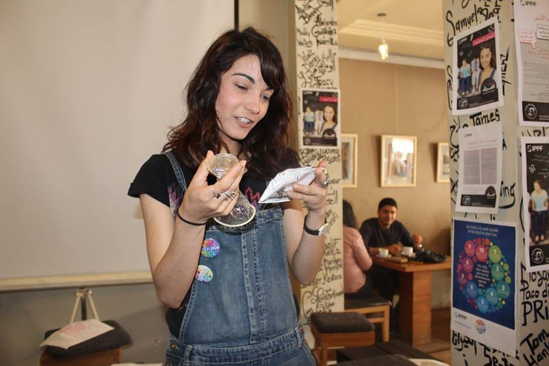 A young volunteer in Tunisia delivering a session on contraception as part of a wider sex education programme.