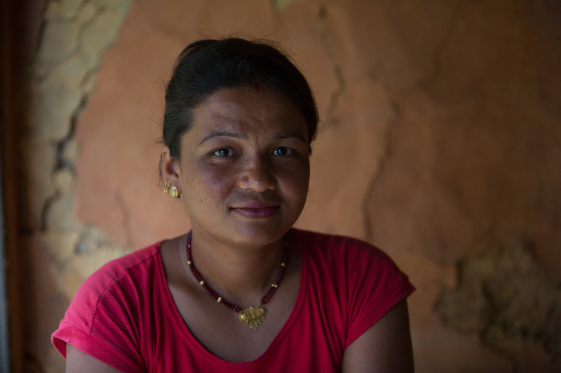 Muna lives with her husband and two children in Bakultar, a rambling village of mud houses, tea shacks and vegetable, miles off a main road, at the end of a long dirt track in Kavre district.  When the earthquake struck, she and her family were cleaning the cowshed.  “It was so scary,” she says. “The children were not at home: we were so worried about the children and went looking for them. They were also looking for us.”