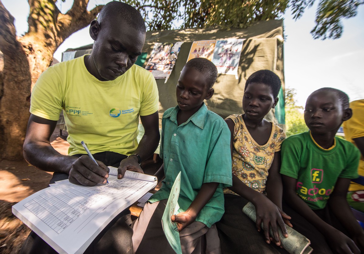 Young children are registered for their vaccinations. 