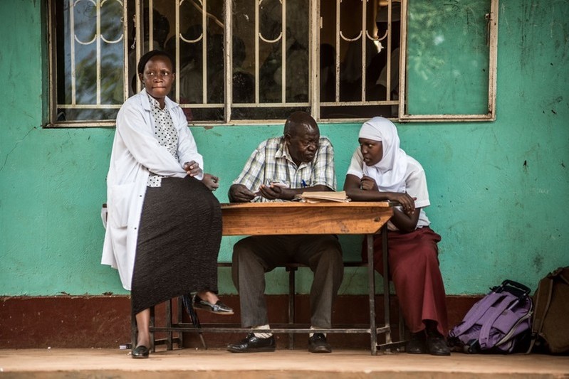 Stevens, a nurse and VODA volunteer, counsels a student during a mobile outreach event on safe abortion and reproductive health at secondary school.