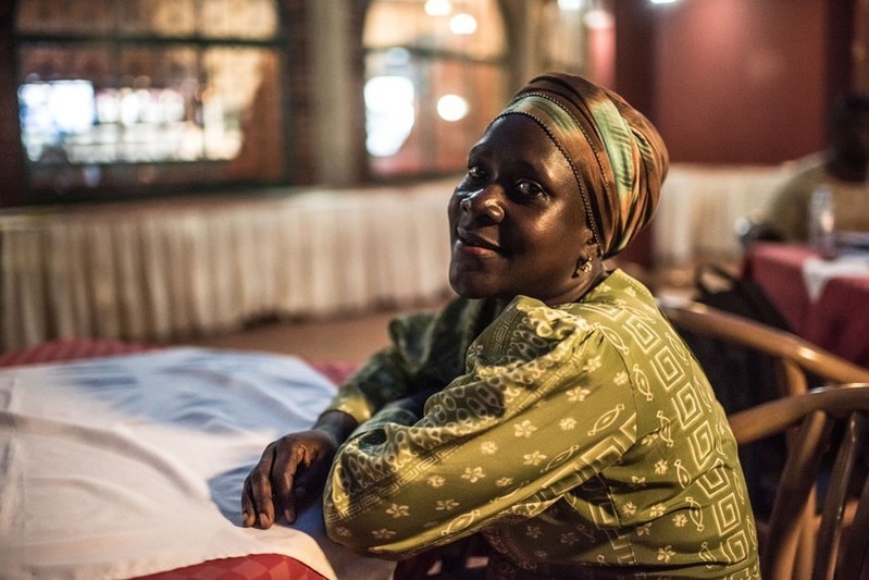 Joan, a former sex worker and beneficiary of the Lady Mermaid's Bureau project, photographed in a hotel in central Kampala.