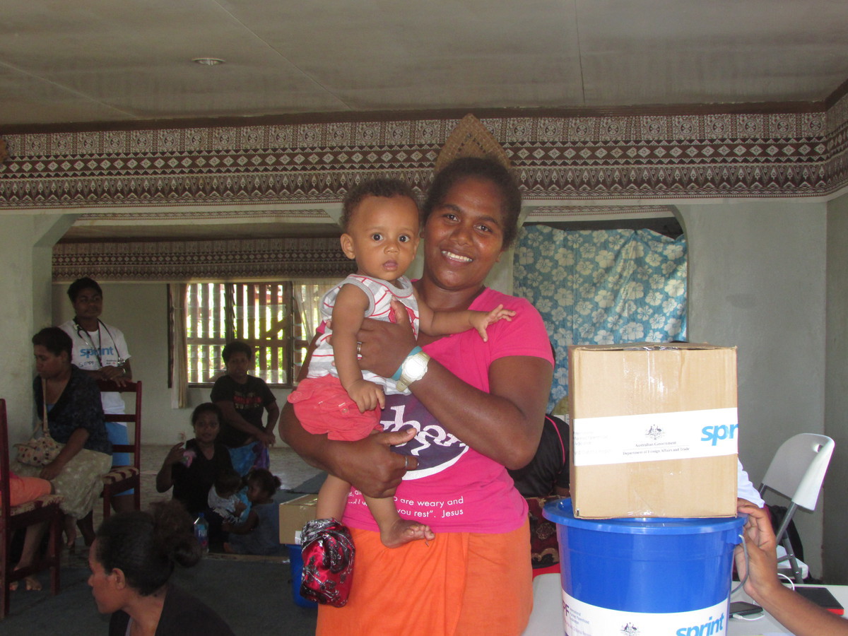 One of the clients of IPPF camp with her child