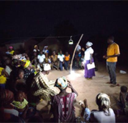 A night meeting in Ghana held using solar lanterns