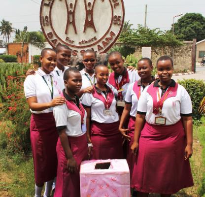 School girls with their pink box for sanitary pads