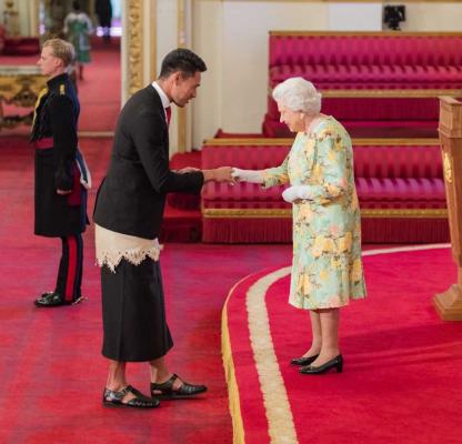 Joshua Sefesi meeting the Queen