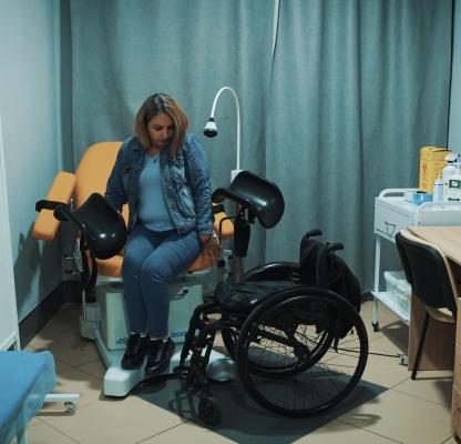 A Ukrainian woman receiving support.