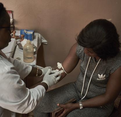 nurse with client - Cameroon