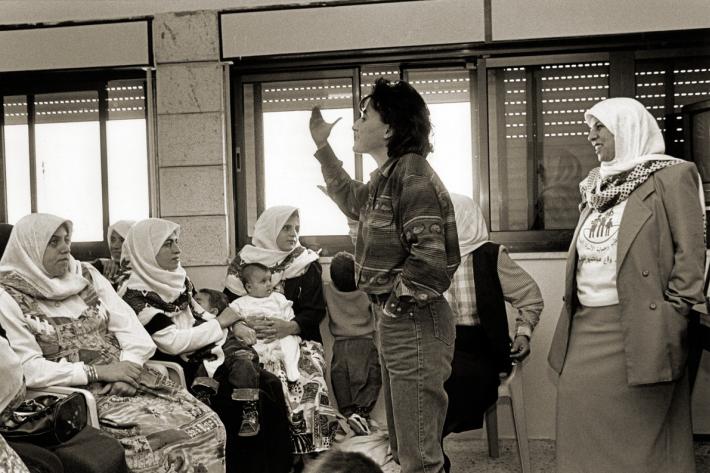 PFPPA staff at the clinic in the West Bank holding an information session on family planning. Palestine, 1995